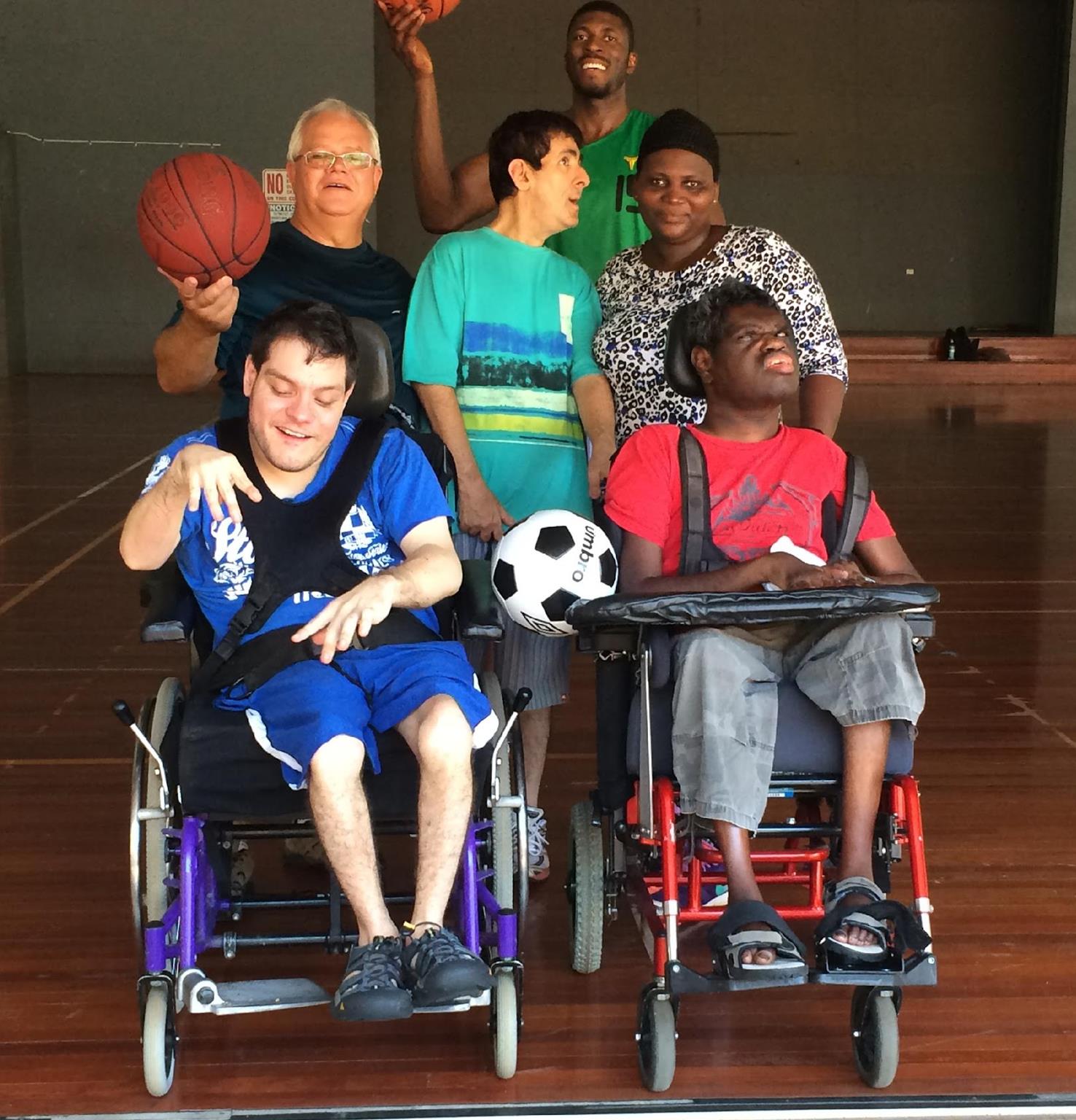 Inclusive sport participants with a MADE Concepts coach, from the mentoring brochure
